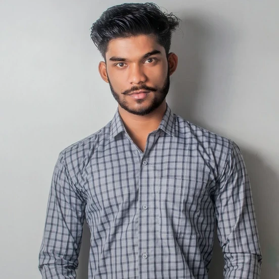 man in gray and black checkered sport shirt and black pants outfit